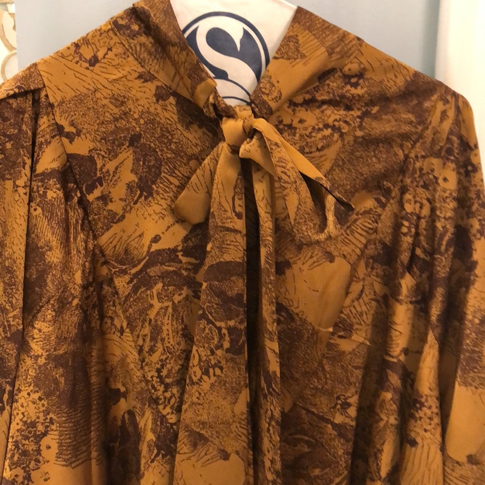 Beulah gold swing blouse. NWT